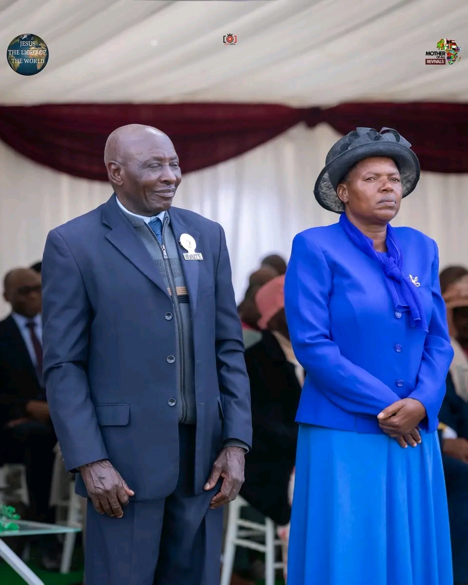 Mother Of All Revivals — couple standing in the tent