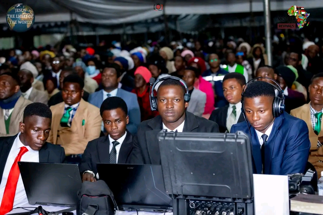 Mother Of All Revivals — media team operating livestream equipment